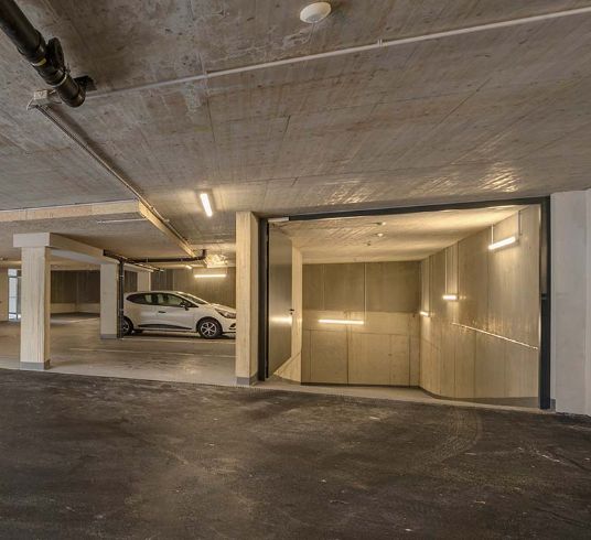 Modern, large underground car park with e-charging station - St. Anton, Arlberg